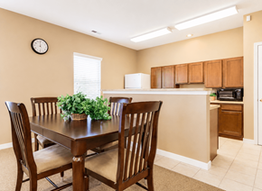 Ashland townhouse for rent - A dining room with a table and chairs.