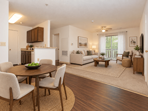 Richmond apartment for rent - A dining room with a round table and chairs.