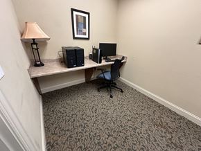 Sanford apartment for rent - a small office with a desk and a computer
