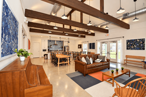 Haslet apartment for rent - A clubhouse with a dining area and a couch.
