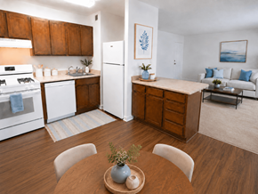 Hampton apartment for rent - A kitchen with white appliances and wooden cabinets.