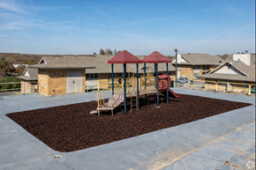 North Little Rock apartment for rent - A playground with a red roof and a slide.