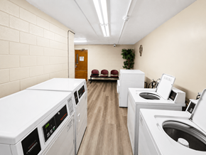 Columbus apartment for rent - A row of washing machines in a laundromat.