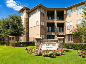 Dallas apartment for rent - A building with a sign that says Carpenters Point Senior Living.