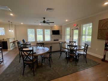 Greenville apartment for rent - a dining room and living room with a couch and a table