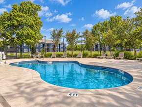 San Marcos townhouse for rent - A swimming pool with a person standing on the side.