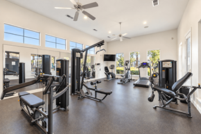 San Marcos townhouse for rent - A spacious home gym with a variety of exercise equipment.