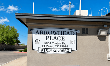 El Paso apartment for rent - A sign for Arrowhead Place in El Paso, TX is displayed on a building.