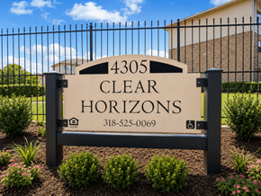 Shreveport townhouse for rent - A sign for Clear Horizons with a phone number on it.
