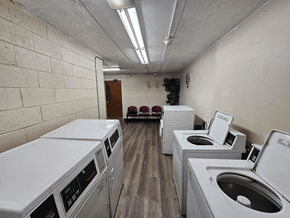 Columbus apartment for rent - an empty laundry room with washing machines and dryers