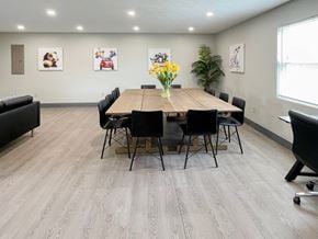 Omaha apartment for rent - A conference room with a long table and chairs.