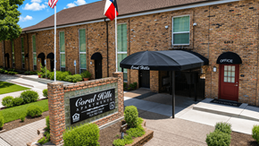 Houston apartment for rent - A brick building with a sign that says "Coral Hills Apartment".