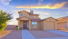 Horizon apartment for rent - a house with a sunset in the background