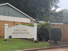 Alexandria apartment for rent - a sign for the apartments is shown in front of a gate