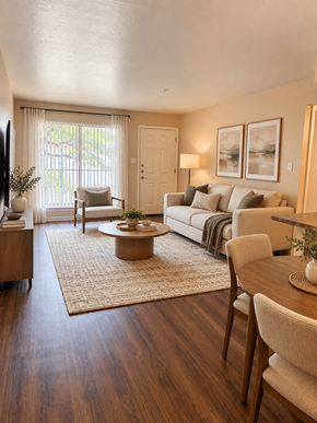 The Woodlands apartment for rent - A living room with a couch, chair, and coffee table.