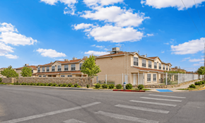 El Paso apartment for rent - A large house with a driveway in front of it.