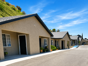 El Paso apartment for rent - A row of houses with a hill in the background.