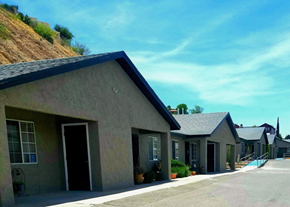 El Paso apartment for rent - a building with a mountain in the background and a blue sky