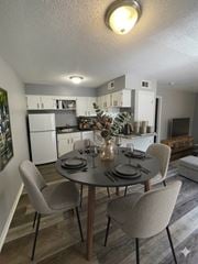 Memphis apartment for rent - A dining room with a table set for four.