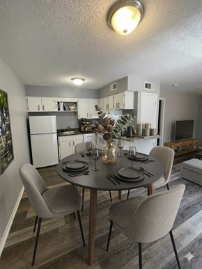 Memphis apartment for rent - A dining room with a table set for four.