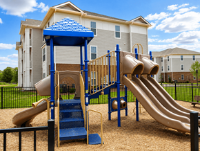 Lebanon apartment for rent - A playground with a blue and yellow slide and a wooden structure.