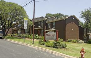 Austin townhouse for rent - A house with a sign that says Marshall in front of it.