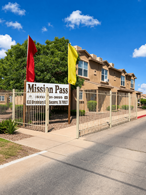 Socorro townhouse for rent - A sign for Mission Pass in front of a building.