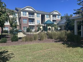 Elizabeth City apartment for rent - an apartment building with a yard and a gazebo