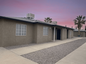 El Paso apartment for rent - a house with a driveway and a pink sky above it