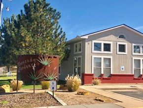 Lamar apartment for rent - a building with a sign in front of it