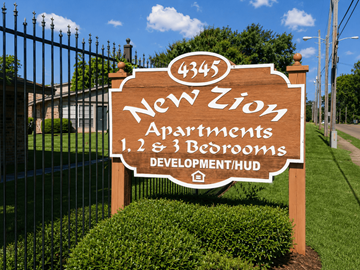 Shreveport apartment for rent - A sign for New Zion Apartments with 1, 2, and 3 bedrooms.