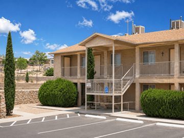 El Paso apartment for rent - A building with a parking lot in front of it.