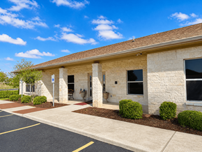 Kerrville apartment for rent - A building with a parking lot in front of it.