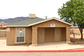 El Paso apartment for rent - a brown building with a sign on the front of it