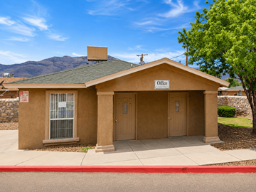 El Paso apartment for rent - A small building with a brown roof and a sign that says "Office" on it.