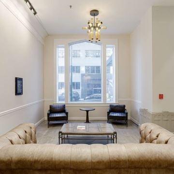 Chattanooga apartment for rent - A living room with a couch, chairs, and a table.