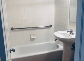 Aurora apartment for rent - a bathroom with a sink and a bath tub