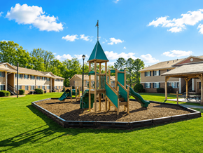 Dublin apartment for rent - A playground with a green slide and a wooden structure with a flag on top.