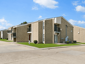Marrero apartment for rent - A row of houses with a clear blue sky above them.