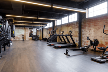 A gym with weights and other exercise equipment