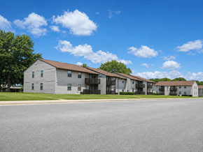 Richmond apartment for rent - A row of houses with a clear blue sky above them.