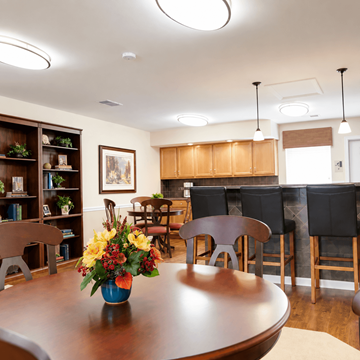 St Peters apartment for rent - A dining room with a wooden table and chairs.