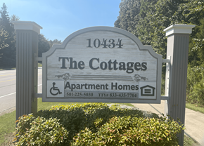 Little Rock apartment for rent - a sign for the cottages apartments and apartment homes