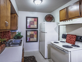 Memphis apartment for rent - a kitchen with white appliances and a refrigerator