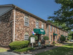 Memphis apartment for rent - the outside of a brick building with a sign that says roses on it
