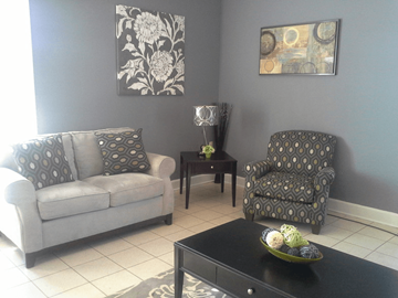 Walls apartment for rent - a living room with couches and a coffee table