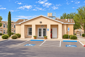 El Paso townhouse for rent - A building with a parking lot in front of it.