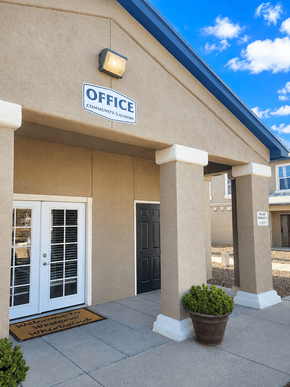 Horizon townhouse for rent - A building with a sign that says Office.