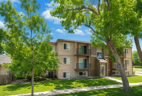 Denver apartment for rent - A large two-story house with a balcony on the second floor.