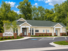 Lumberton apartment for rent - A building with a sign that says Windborne in front of it.